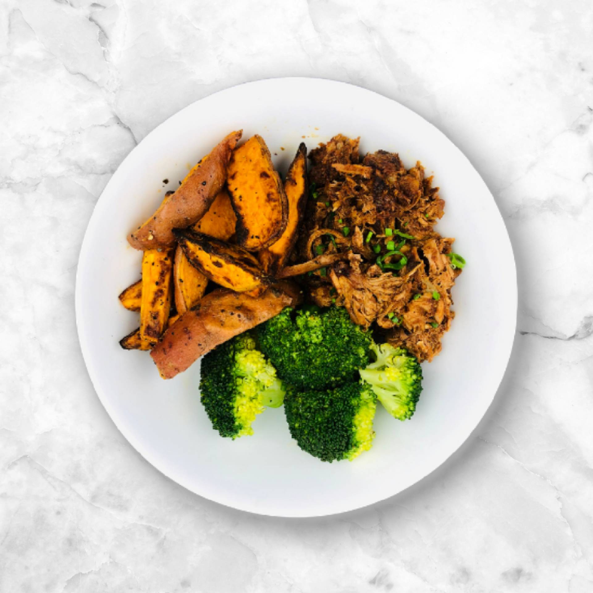 BBQ PULLED PORK, SWEET POTATO WEDGES, BROCCOLI