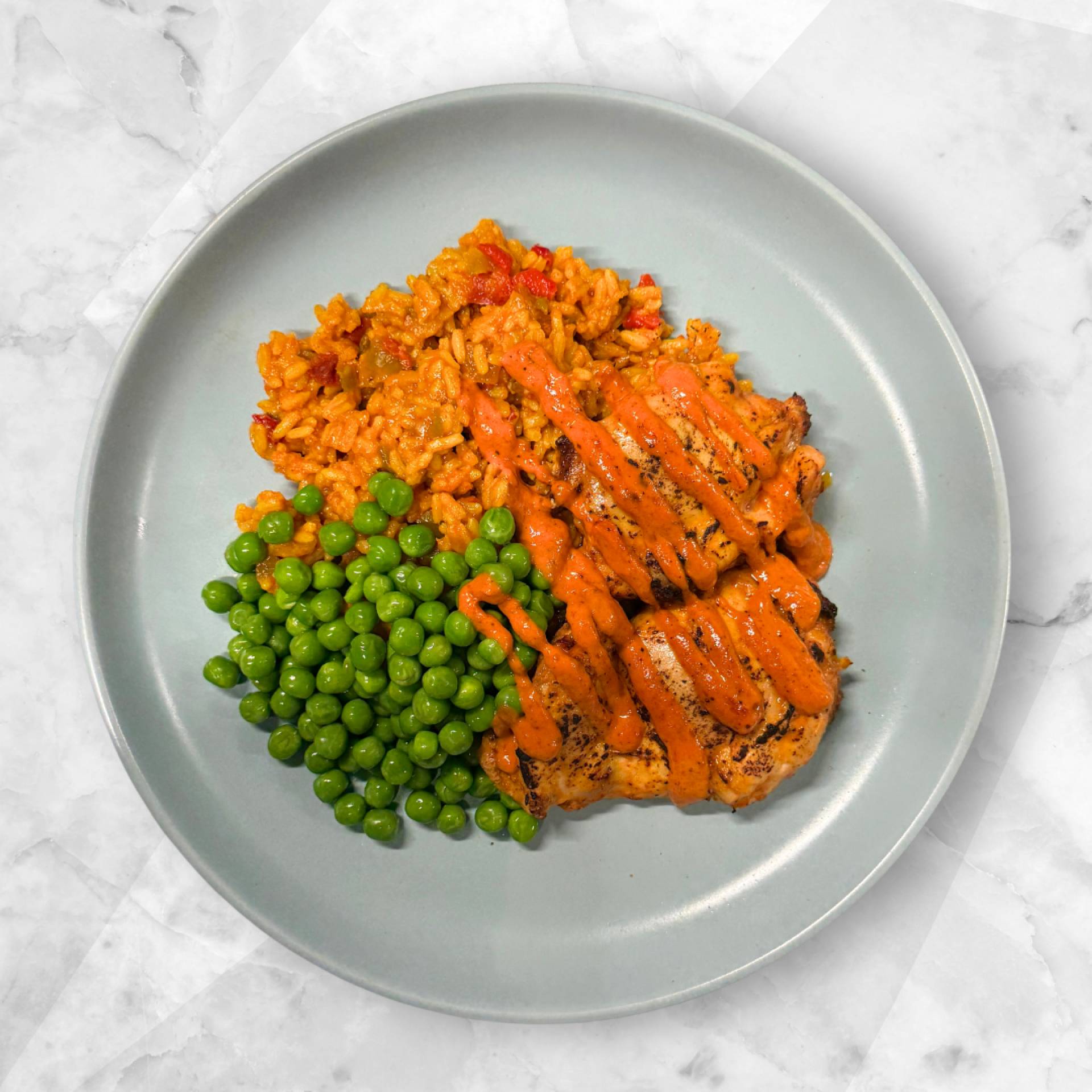 PIRI CHICKEN, SPICY RICE, MACHO PEAS AND PIRI SAUCE