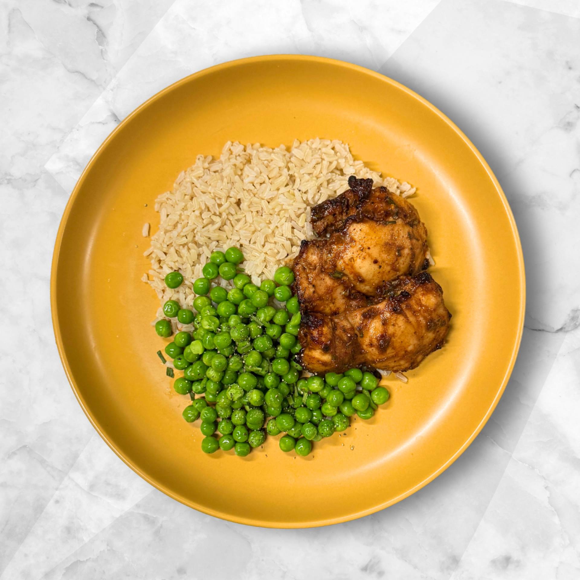 JERK CHICKEN THIGHS, STEAMED RICE, MACHO PEAS